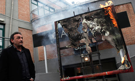 Whoa. Naples museum director begins burning art to protest at lack of funding